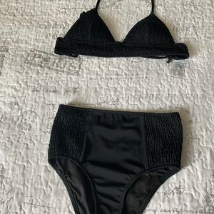 Black Victoria secret two piece swimsuit. Never been worn.